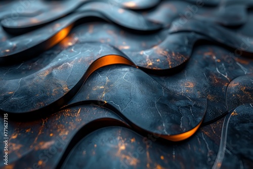 Close-up of a dimpled dark surface with rhythmic wavy patterns highlighted by orange reflections photo