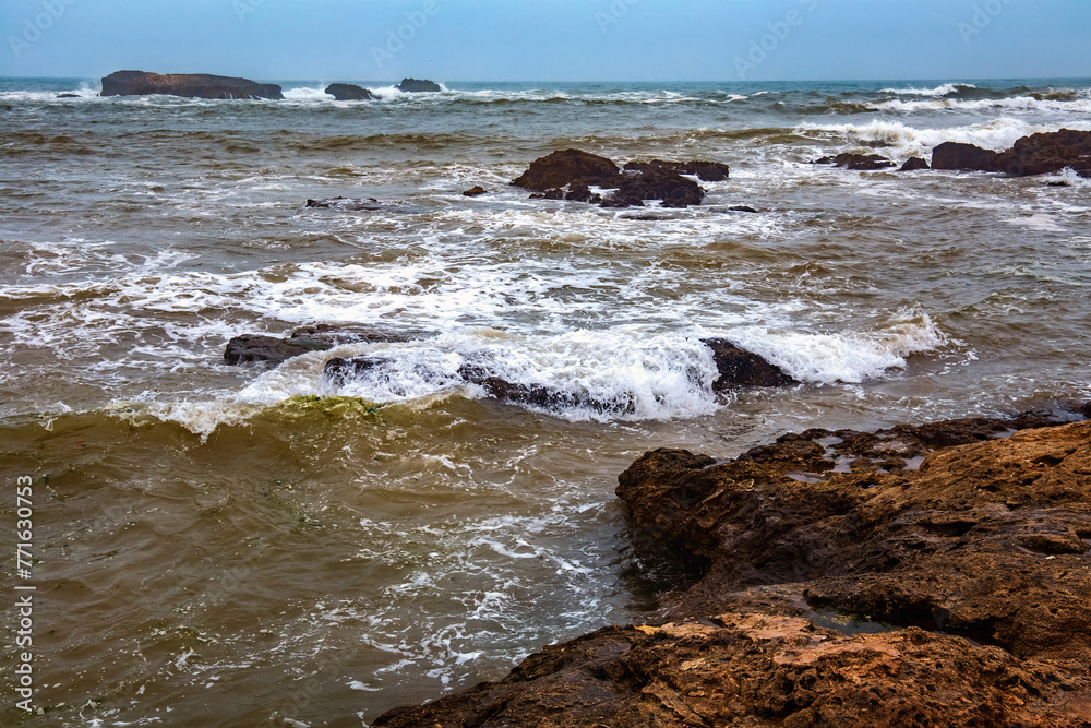 View of the volcanic shore of the Atlantic Ocean in the area of Essaouira in Morocco.