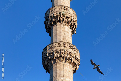 View at one of the minarets of the New Mosque (originally named the Valide Sultan Mosque). This is ancient Ottoman mosque in Istanbul. Turkey