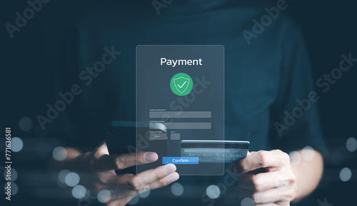 Secure Online Payment Transaction Process concept. Person confirming a secure online payment using a credit card through a digital interface with verification tick symbol. Internet banking, fintech, photo