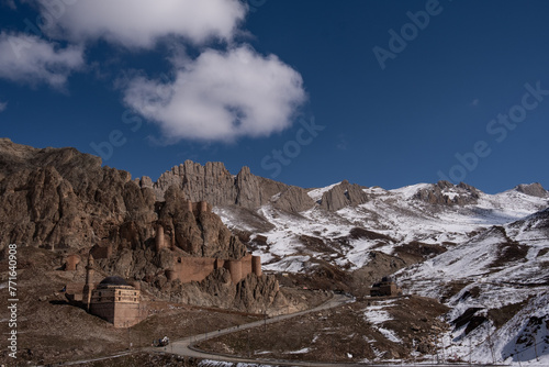 Dogubayazıt, Turkey, Middle East: panoramic and breathtaking view of the ancient castle of Old Beyazit near the famous Ishak Pasha Palace and Eski Bayezid Cami mosque, on the road up to the mountains photo