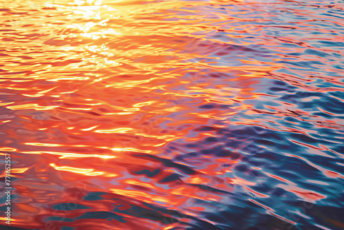 The water is a deep blue color with orange and red reflections