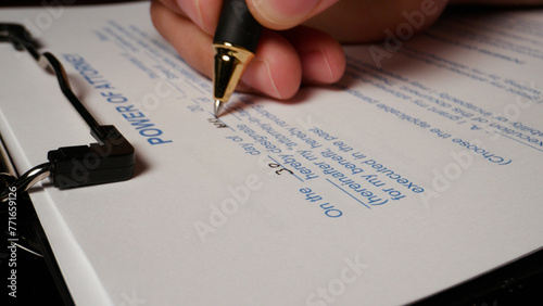 5 photo hispanic male hand filling out writing power of attorney form