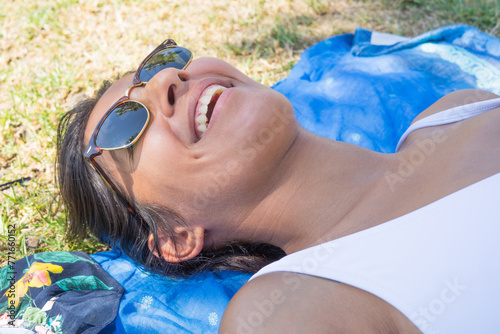 Young indian woman happy in pool