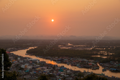 Pak Nam Chumphon town, fisherman village, and river from Khao Matsee scenic viewpoint during sunset, Chumphon province, Thailand