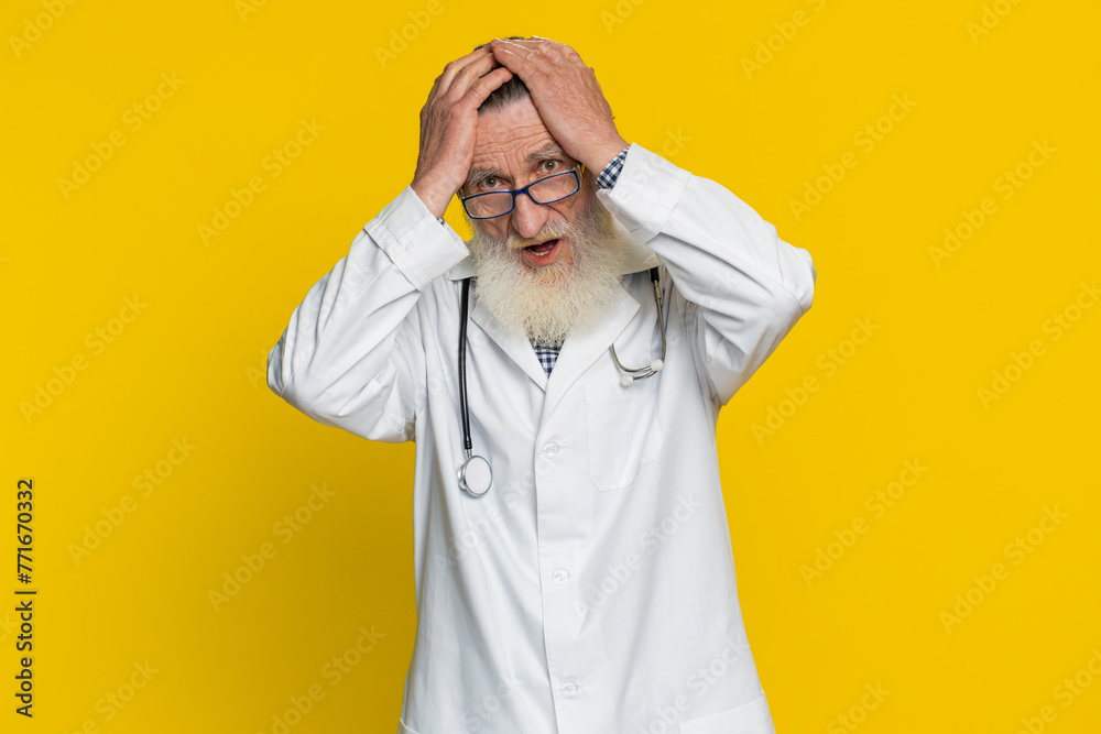 Senior doctor cardiologist old man feeling hopelessness and loneliness, nervous breakdown, loses, bad fortune loss unlucky news, fail. Apothecary pharmacy grandfather isolated on yellow background Senior doctor cardiologist old man feeling hopelessness and loneliness, nervous breakdown, loses, bad fortune loss unlucky news, fail. Apothecary pharmacy grandfather isolated on yellow background