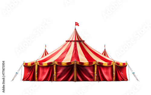 A colorful circus tent stands tall with a flag fluttering proudly on top