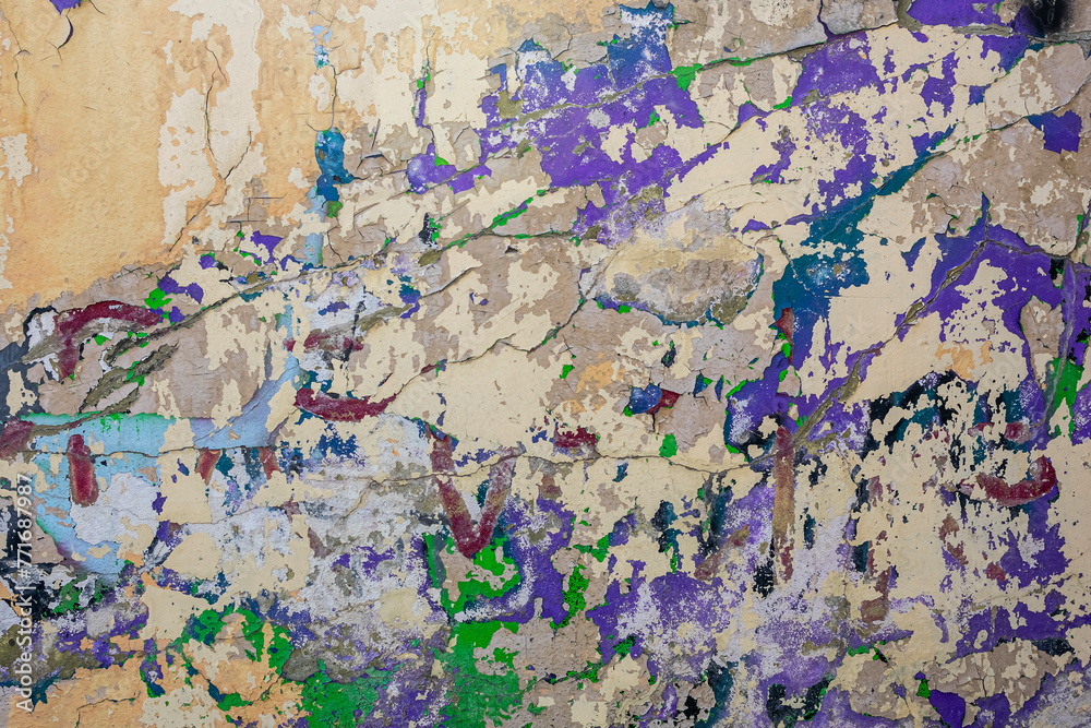 Fototapeta premium Abstract multicolor grunge background with abstract color texture. Abstraction from collapsing graffiti on the wall. Weathered wall background