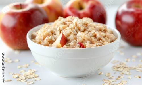 oatmeal with apples in a plate for breakfast