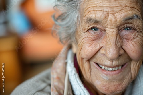 Elderly lady with lively eyes showing a genuine smile, indicative of a life well-lived photo