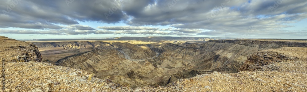 Panoramic picture of the Fish River Canyon in Namibia taken from the upper edge of the south side
