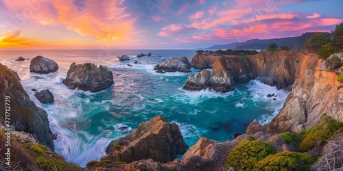 The sun sets beautifully over the ocean  casting vibrant colors on the rocks. Summer nature background  Natural colorful panoramic landscape
