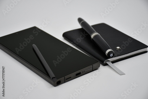 Luxury Smartphone and luxury notebook with pen