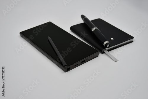 Luxury Smartphone and luxury notebook with pen