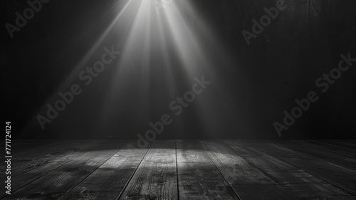 Black room with light rays on wooden floor - Dramatic rays of light piercing the darkness, shining down on a textured wooden floor in a somber setting