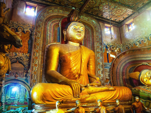 giant golden sitting buddha in Sri Lanka temple bottom view. Wewurukannala Buduraja Maha Viharaya temple. © Elisaveta