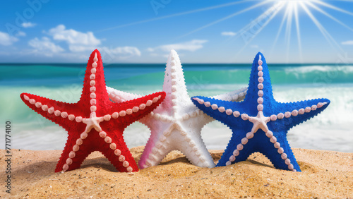 Trio of Colorful Red, White, and Blue Starfish on a Sunny Beach: Copy-space