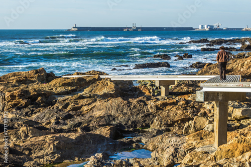 Footpath on a Atlantic Ocean beach in Nevogilde area of Porto city, Portugal photo