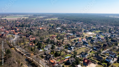 Aerial View of Wienhausen, Lush Greenery Amidst German Homes photo