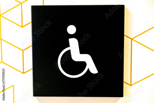 Accessible Restroom Sign with Geometric Background photo