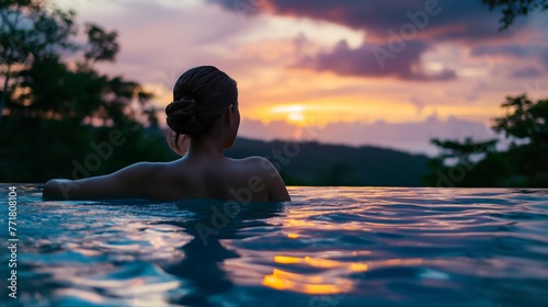 Woman enjoying a spa pool at twilight. Rest after hard working days