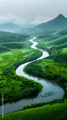Panoramic view of a Kilometers' Long Serene River Winding through Lush Green Valleys