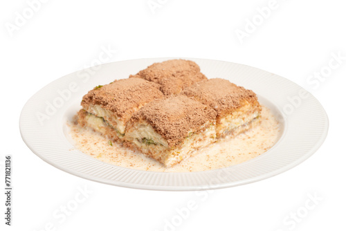 Cold baklava with pistachios isolated on white background. Turkish cuisine delicacies. Ramadan Dessert. local name so  uk baklava