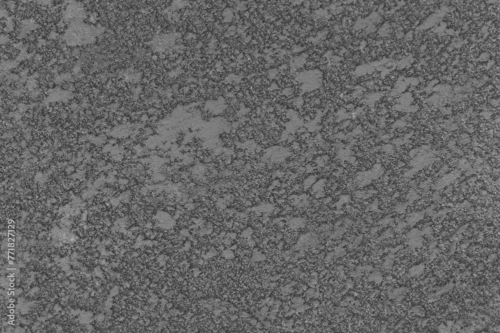 Fototapeta premium Dark grey wall surface with abstract pattern concrete cement plaster texture stucco background