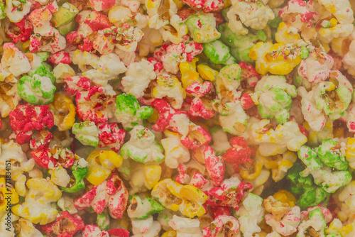 Multicolored sweet popcorn, crunchy corn background texture food color