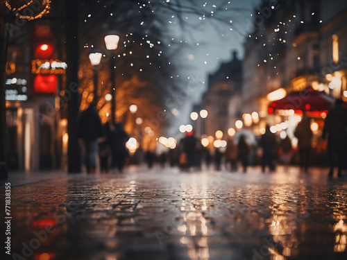 A blurred bokeh effect captures the city center's bustling night street.