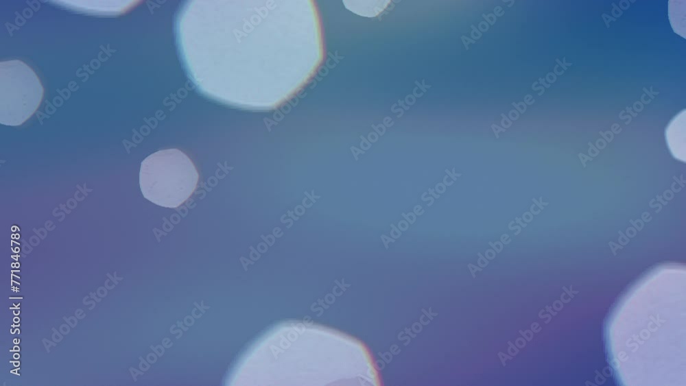 A dreamlike bluish-purple scene with scattered white dots, resembling a blurred photograph taken with a slow shutter speed to create an ethereal effect