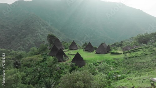Aerial view of the remote and mysterious village of Wae Rebo, Indonesia photo