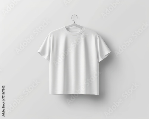 White T-shirt on a hanger isolated on white background.