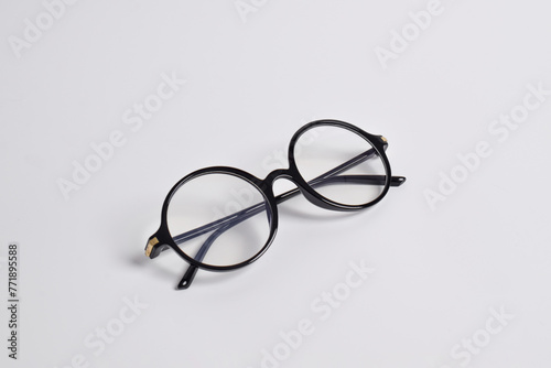 Stylish glasses with round black frames isolated on white background. anti-UV glasses