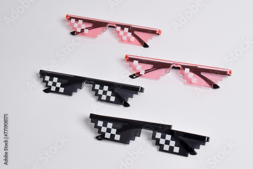 Thug life glasses black and pink color isolated on white background. Pixel art glasses photo