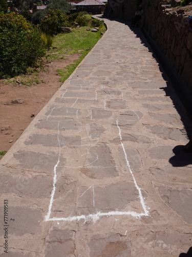 [Peru] The squares of Hopscotch drawn on the cobblestones in Taquile Island (Puno)