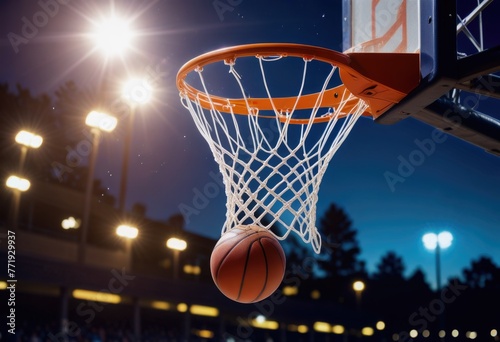 A basketball sails through the air, swooshing into the hoop on the basketball court with precision © SR Creative Idea