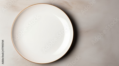 Empty white plate on a simple background