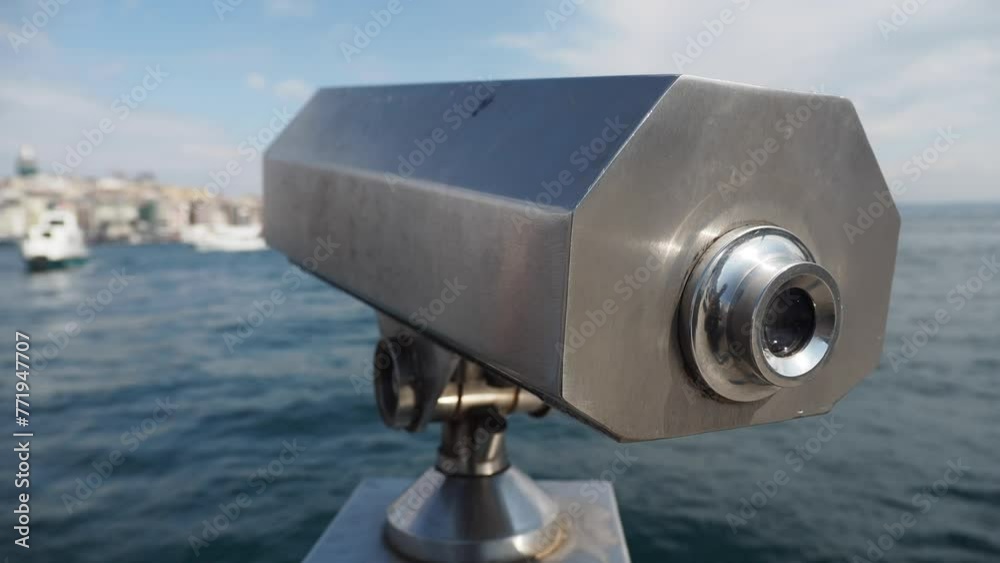 Coin-operated binoculars looking out over city , Coin-operated binoculars looking out over city ,