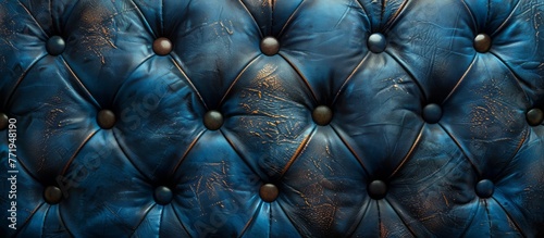 Dark blue background with a leather texture and dotted pattern, dark blue background with a dotted leather texture for the design of interior elements, interior decoration, home textiles or wallpaper  photo
