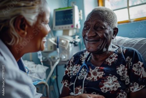 Compassionate Healthcare. African doctor smiling warmly at an elderly patient, delivering positive news during a check-up in a hospital room, conveying empathy and trust. photo