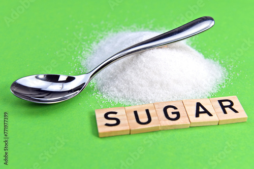 sugar with metal spoon