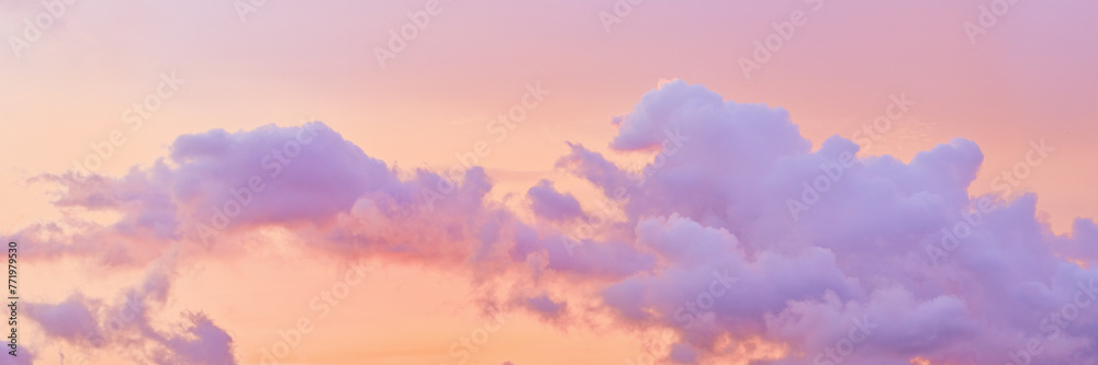 Aesthetic Pastel Sunset, violet fluffy clouds on pink peach colored sky, dreamy cloudscape pastel tones, surreal dreamscape at sunset, soft colorful heaven, wide banner, panoramic view. Aesthetic Pastel Sunset, violet fluffy clouds on pink peach colored sky, dreamy cloudscape pastel tones, surreal dreamscape at sunset, soft colorful heaven, wide banner, panoramic view.