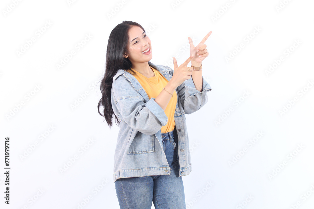 Beautiful young Asian woman pointing aside to copy space with smile face and happy Pretty girl act like a satisfied product, use for advertising with isolated on white background Beautiful young Asian woman pointing aside to copy space with smile face and happy Pretty girl act like a satisfied product, use for advertising with isolated on white background