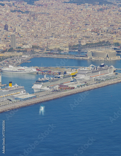 Modern cruiseship cruise ship liner Equinox in port of Barcelona, Spain waiting for passengers at terminal for summer Mediterranean cruising