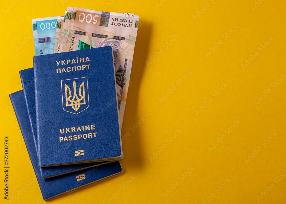 ukrainian passport and 100 euro banknotes ukrainian passport and 100 euro banknotes