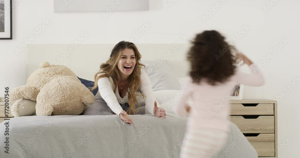 Play, hug and mom with child on bed for morning love, fun and bonding with teddy bear in home. Smile, embrace and wake up, excited mother and daughter in bedroom together with happy woman and kid.