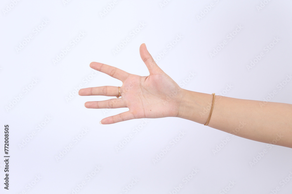 Elegant female palm or wrist isolated on white. counting with five (5) fingers