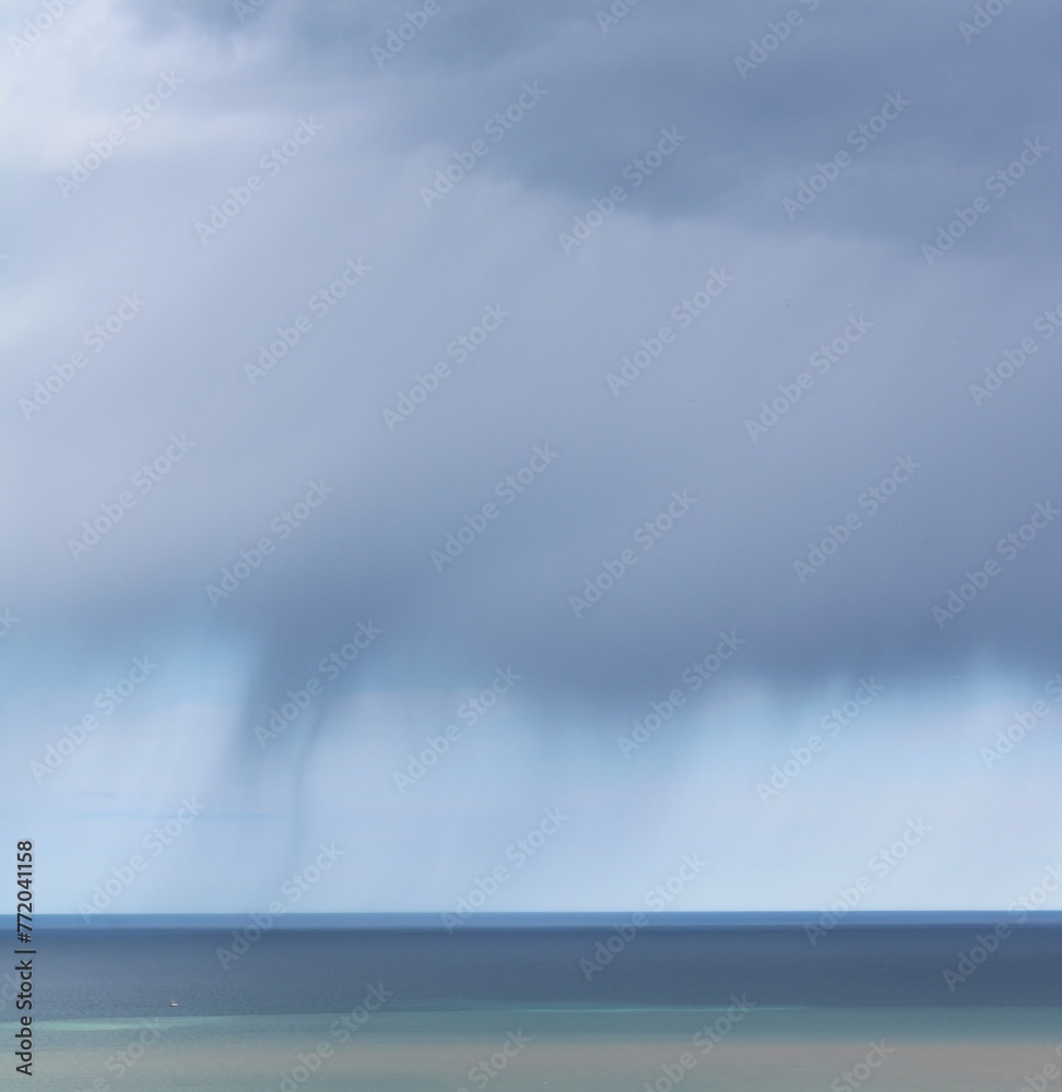 Heavy rain clouds above the sea