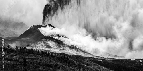 Impressive overview of the 2021 eruption in La Palma with ash cloud and a large fumarole, black and white image photo